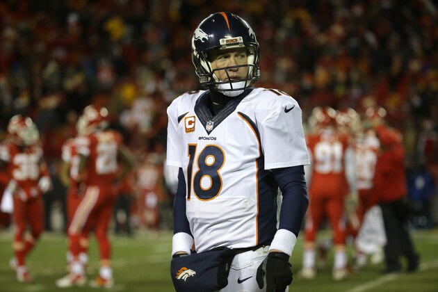 Denver Broncos quarterback Peyton Manning (18) looks down field in the second half of an NFL football game against the Kansas City Chiefs in Kansas City, Mo., Sunday, Nov. 30, 2014. (AP Photo/Charlie Riedel)