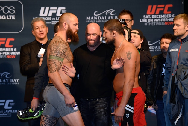Dec 5, 2014; Las Vegas, Nevada, USA; Heavyweights Brendan Schaub (R) and Travis Browne (L) face off during the UFC 181 weigh-ins at Mandalay Bay Events Center. Mandatory Credit: Joe Camporeale-USA TODAY Sports