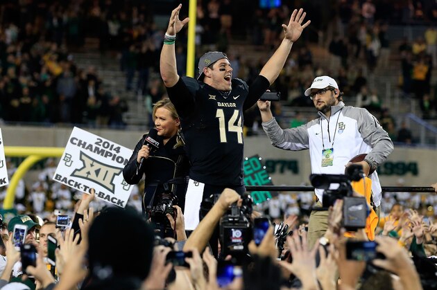 WACO, TX - DECEMBER 06:  Bryce Petty #14 of the Baylor Bears celebrates following their win over Kansas State Wildcats on December 6, 2014  at McLane Stadium in Waco, Texas.  (Photo by Jamie Squire/Getty Images)