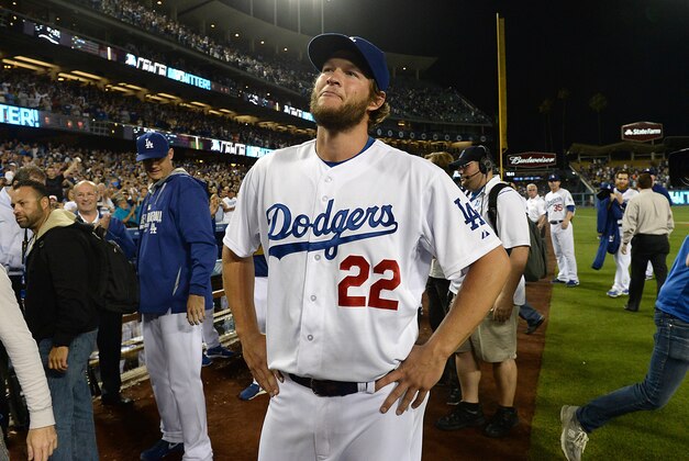 Jun 18, 2014; Los Angeles, CA, USA;    Los Angeles Dodgers starting pitcher Clayton Kershaw (22) looks into the crowd after his no hitter against the Colorado Rockies at Dodger Stadium. Dodgers won 8-0.Mandatory Credit: Jayne Kamin-Oncea-USA TODAY Sports