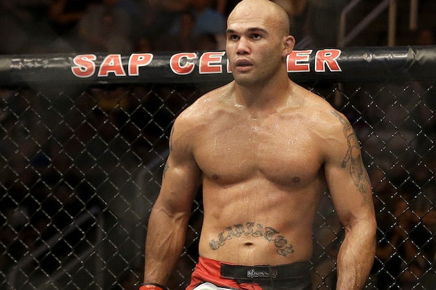 Robbie Lawler fights Matt Brown during a welterweight mixed martial arts bout at a UFC on Fox event in San Jose, Calif., Saturday, July 26, 2014. Lawler won by unanimous decision. (AP Photo/Jeff Chiu)