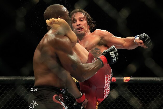 LAS VEGAS, NV - DECEMBER 06:  Josh Samman knocks out  Eddie Gordon to win their fight during the UFC 181 event at the Mandalay Bay Events Center on December 6, 2014 in Las Vegas, Nevada.  (Photo by Alex Trautwig/Getty Images)
