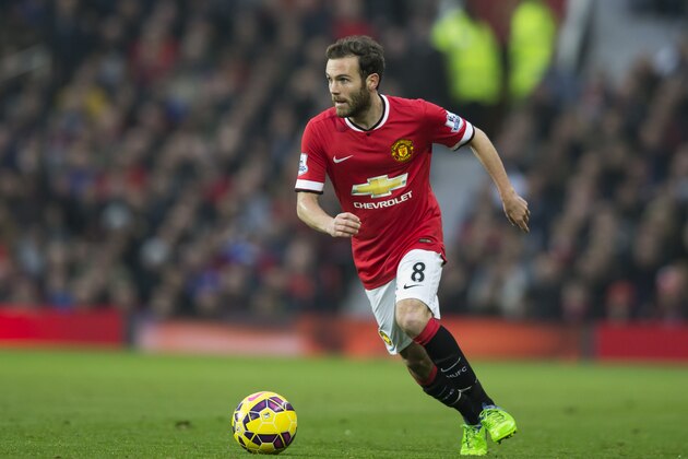Manchester United's Juan Mata is seen during the English Premier League soccer match between Manchester United and Hull City at Old Trafford Stadium, Manchester, England, Saturday Nov. 29, 2014. (AP Photo/Jon Super)