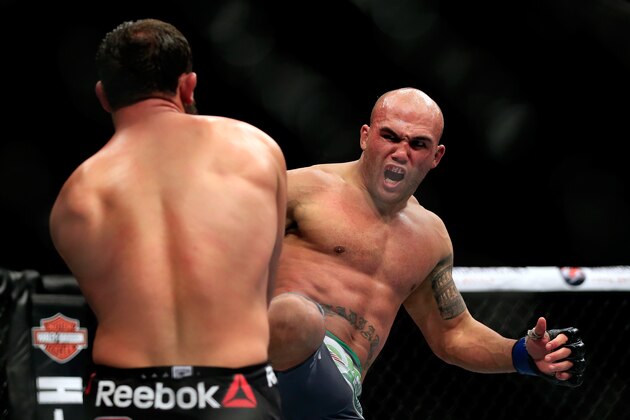 LAS VEGAS, NV - DECEMBER 06:  Robbie Lawler kicks Johny Hendricks in their welterweight title fight during the UFC 181 event at the Mandalay Bay Events Center on December 6, 2014 in Las Vegas, Nevada.  (Photo by Alex Trautwig/Getty Images)