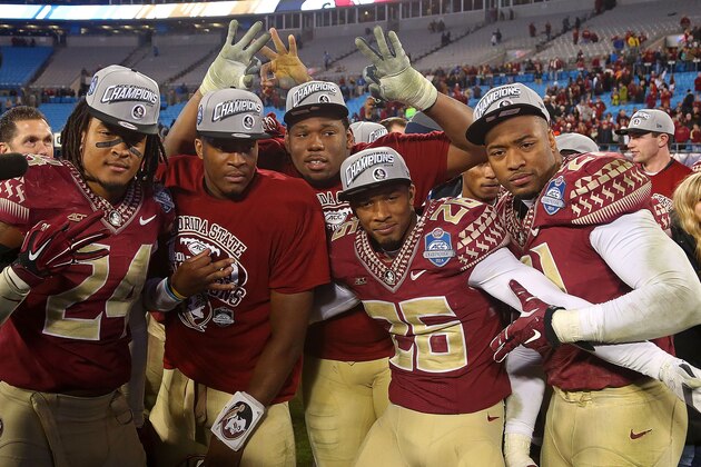 CHARLOTTE, NC - DECEMBER 06:  Matthew McNulty #24 , Jameis Winston #5 and P.J. Williams congratulate each other after their 37-35 victory over the Georgia Tech Yellow Jackets at the ACC Championship game on December 6, 2014 in Charlotte, North Carolina.  (Photo by Mike Ehrmann/Getty Images)