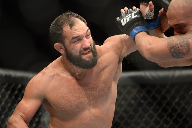 Dec 6, 2014; Las Vegas, NV, USA; Johnny Hendricks (red) and Robbie Lawler (blue) during UFC 181 at Madalay Bay Events Center. Lawler won via unanimous decision. Mandatory Credit: Joe Camporeale-USA TODAY Sports
