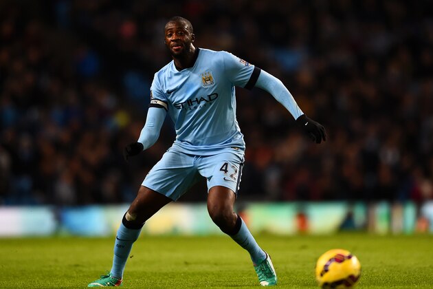 MANCHESTER, ENGLAND - DECEMBER 06:  Yaya Toure of Manchester City in action during the Barclays Premier League match between Manchester City and Everton at Etihad Stadium on December 6, 2014 in Manchester, England.  (Photo by Laurence Griffiths/Getty Images)
