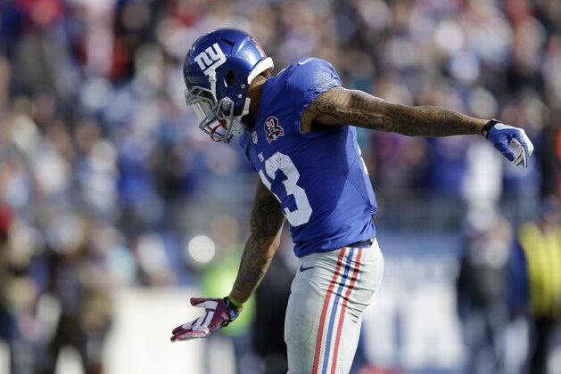 New York Giants wide receiver Odell Beckham Jr. (13) celebrates a 15-yard touchdown pass against the Tennessee Titans in the first half of an NFL football game Sunday, Dec. 7, 2014, in Nashville, Tenn. (AP Photo/Mark Zaleski) New York Giants wide receiver Odell Beckham Jr. (13) celebrates a 15-yard touchdown pass against the Tennessee Titans in the first half of an NFL football game Sunday, Dec. 7, 2014, in Nashville, Tenn. (AP Photo/Mark Zaleski)