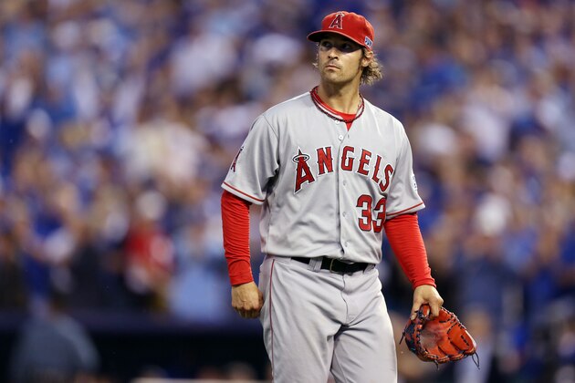 KANSAS CITY, MO - OCTOBER 05:  C.J. Wilson #33 of the Los Angeles Angels looks on in the first inning against the Kansas City Royals during Game Three of the American League Division Series at Kauffman Stadium on October 5, 2014 in Kansas City, Missouri.  (Photo by Ed Zurga/Getty Images)