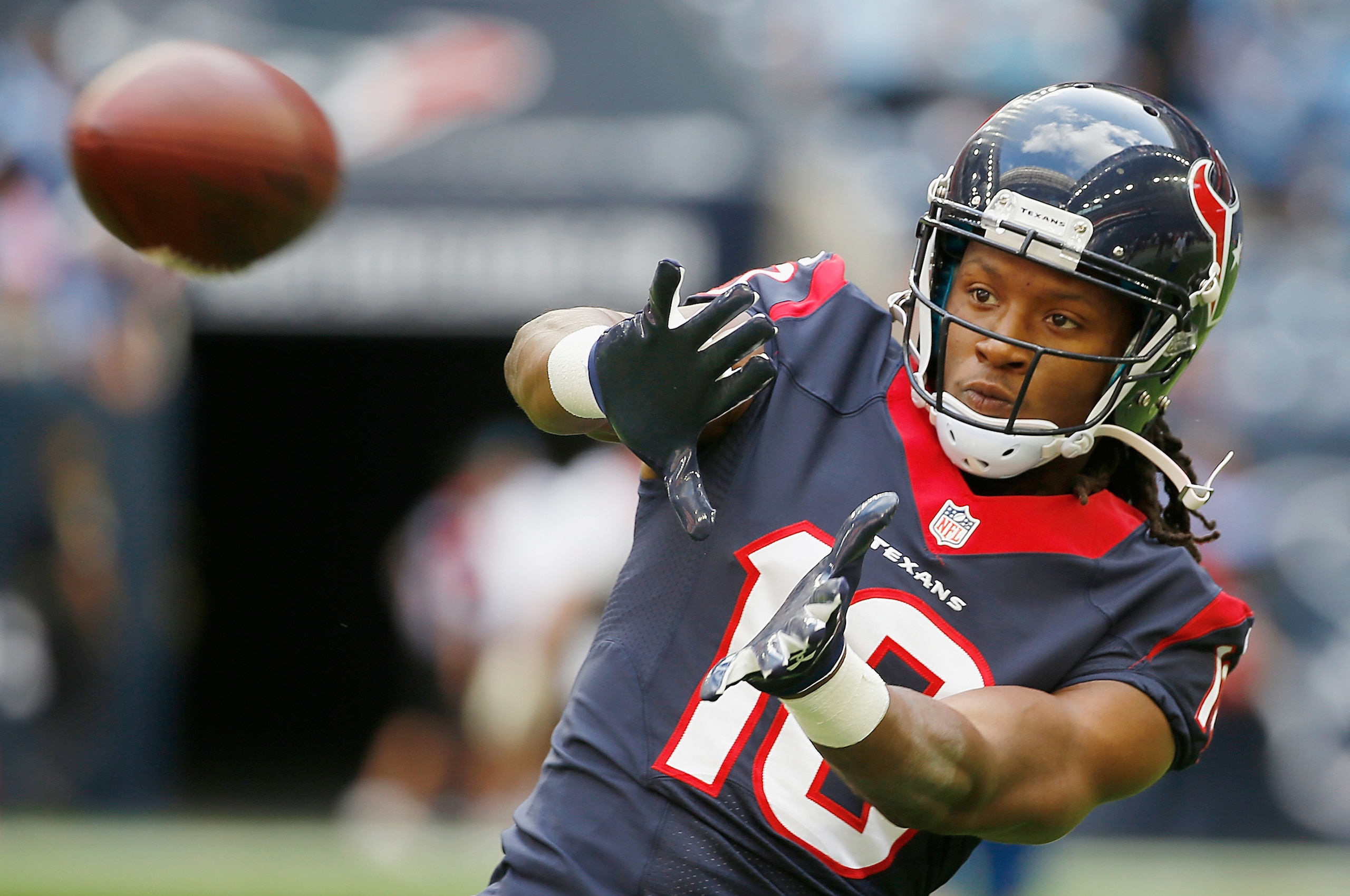 HOUSTON, TX - NOVEMBER 30:  DeAndre Hopkins #10 of the Houston Texans in action on the field prior to the start of their game against the Tennessee Titans at NRG Stadium on November 30, 2014 in Houston, Texas.  (Photo by Scott Halleran/Getty Images)