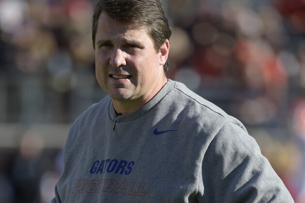 Florida head coach Will Muschamp watches warmups before an NCAA college football game against Florida State in Tallahassee, Fla., Saturday, Nov. 29, 2014.(AP Photo/Phelan M. Ebenhack)