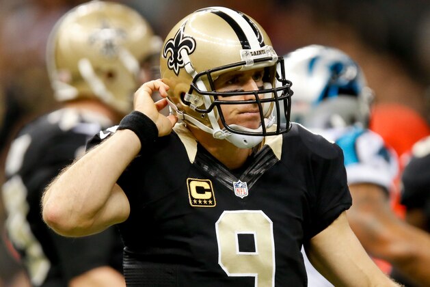 Dec 7, 2014; New Orleans, LA, USA; New Orleans Saints quarterback Drew Brees (9) against the Carolina Panthers during the first half of a game at the Mercedes-Benz Superdome. Mandatory Credit: Derick E. Hingle-USA TODAY Sports