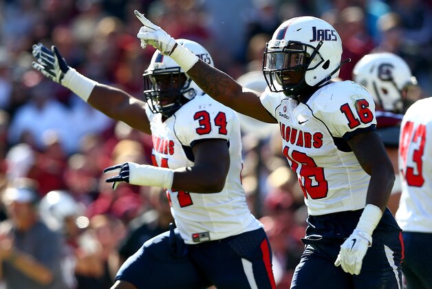 COLUMBIA, SC - NOVEMBER 22:  Teammates Desmond LaVelle #34 and Montell Garner #16 of the South Alabama Jaguars celebrate after recovering a fumble against the South Carolina Gamecocks during their game at Williams-Brice Stadium on November 22, 2014 in Columbia, South Carolina.  (Photo by Streeter Lecka/Getty Images)