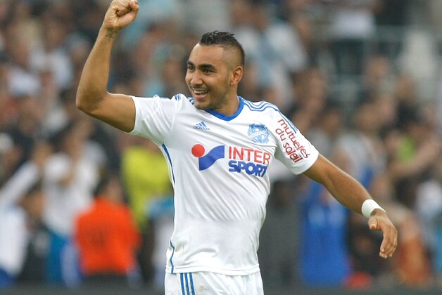 Marseille's French forward Dimitri Payet celebrates with supporters after defeating Saint-Etienne in their League One soccer match, at the Velodrome Stadium, in Marseille, southern France, Sunday, Sept. 28, 2014. (AP Photo/Claude Paris) Marseille's French forward Dimitri Payet celebrates with supporters after defeating Saint-Etienne in their League One soccer match, at the Velodrome Stadium, in Marseille, southern France, Sunday, Sept. 28, 2014. (AP Photo/Claude Paris)