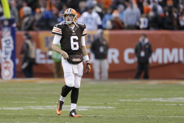 Cleveland Browns quarterback Brian Hoyer walks off the field after throwing an interception in the final seconds of a 25-24 loss to the Indianapolis Colts in an NFL football game Sunday, Dec. 7, 2014, in Cleveland. (AP Photo/Tony Dejak)