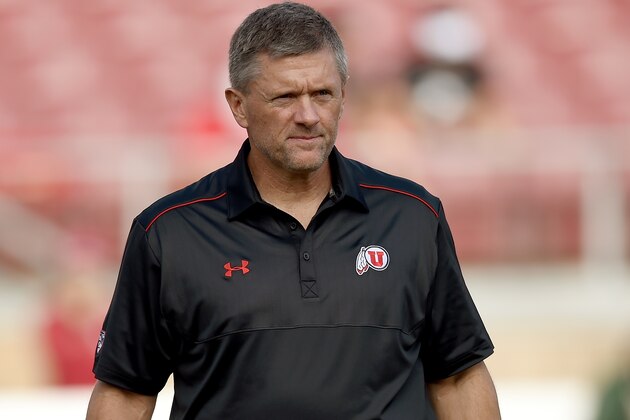 PALO ALTO, CA - NOVEMBER 15:  Head coach Kyle Whittingham of the Utah Utes looks on while his team stretches prior to playing the Stanford Cardinals at Stanford Stadium on November 15, 2014 in Palo Alto, California.  (Photo by Thearon W. Henderson/Getty Images)