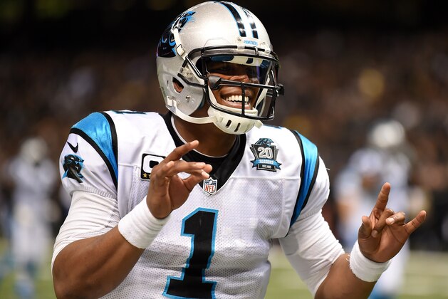 NEW ORLEANS, LA - DECEMBER 07:   Cam Newton #1 of the Carolina Panthers celebrates after throwing a touchdown pass early in the second quarter against the New Orleans Saints  at Mercedes-Benz Superdome on December 7, 2014 in New Orleans, Louisiana.  (Photo by Stacy Revere/Getty Images)