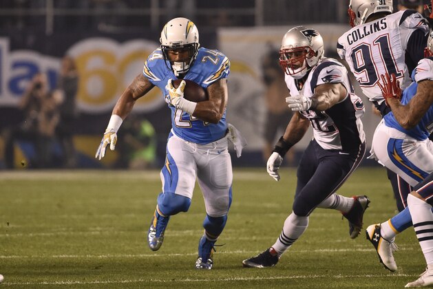 San Diego Chargers running back Ryan Mathews runs up the middle against the New England Patriots during the first half in an NFL football game Sunday, Dec. 7, 2014, in San Diego. (AP Photo/Denis Poroy)