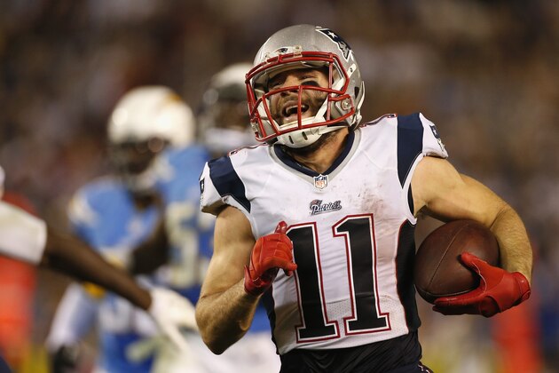 SAN DIEGO, CA - DECEMBER 07:  Wide receiver Julian Edelman #11 of the New England Patriots scores a 66-yard touchdown against the San Diego Chargers at Qualcomm Stadium on December 7, 2014 in San Diego, California.  (Photo by Todd Warshaw/Getty Images)
