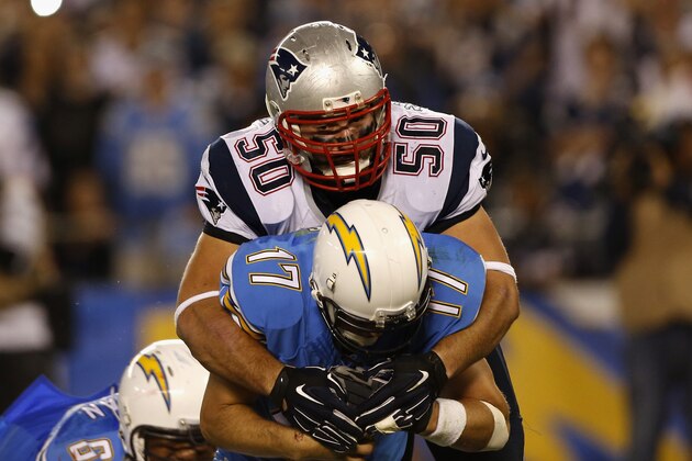 SAN DIEGO, CA - DECEMBER 07:  Defensive end Rob Ninkovich #50 of the New England Patriots sacks quarterback Philip Rivers #17 of the San Diego Chargers at Qualcomm Stadium on December 7, 2014 in San Diego, California.  (Photo by Todd Warshaw/Getty Images)