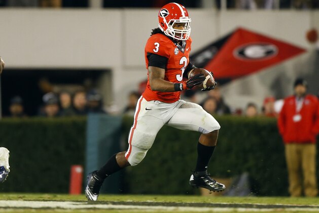 Georgia running back Todd Gurley (3) breaks into the open against Auburn in the second half of an NCAA college football game Saturday, Nov. 15, 2014, in Athens, Ga. (AP Photo/John Bazemore)