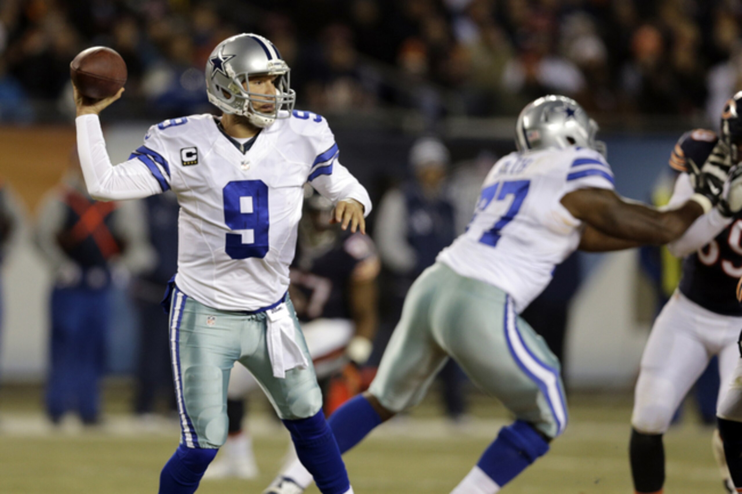 Dallas Cowboys quarterback Tony Romo (9) throws a pass during the first half of an NFL football game against the Chicago Bears Thursday, Dec. 4, 2014, in Chicago. (AP Photo/Nam Y. Huh) Dallas Cowboys quarterback Tony Romo (9) throws a pass during the first half of an NFL football game against the Chicago Bears Thursday, Dec. 4, 2014, in Chicago. (AP Photo/Nam Y. Huh)