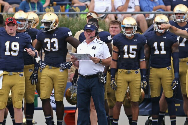 SOUTH BEND, IN - AUGUST 30:  Head coach Brian Kelly of the Notre Dame Fighting Irish watches as his team takes on the Rice Owls at Notre Dame Stadium on August 30, 2014 in South Bend, Indiana.  (Photo by Jonathan Daniel/Getty Images)