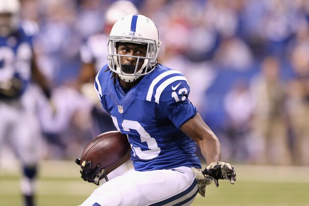 INDIANAPOLIS, IN - NOVEMBER 16:  T.Y. Hilton #13 of the Indianapolis Colts carries the ball against the New England Patriots during the game at Lucas Oil Stadium on November 16, 2014 in Indianapolis, Indiana.  (Photo by Andy Lyons/Getty Images)