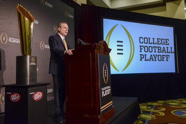 Jeff Long, College Football Playoff selections committee chairman, discusses the selection process of the semifinal pairings and semifinal bowl assignments during a news conference Sunday, Dec. 7, 2014, in Grapevine, Texas.   (AP Photo/Tim Sharp)