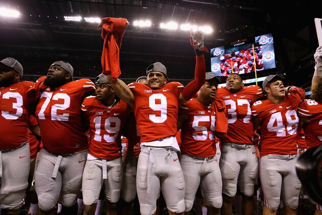 INDIANAPOLIS, IN - DECEMBER 06:  Devin Smith #9 (C) and the Ohio State Buckeyes celebrate after they defeated the Wisconsin Badgers 59-0 in the Big Ten Championship at Lucas Oil Stadium on December 6, 2014 in Indianapolis, Indiana.  (Photo by Andy Lyons/Getty Images)