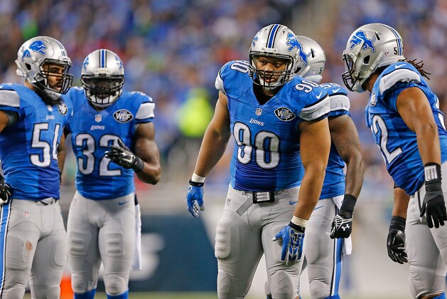 DETROIT, MI - DECEMBER 07:  Ndamukong Suh #90 of the Detroit Lions looks to the sidelines during the third quarter of the game against the Tampa Bay Buccaneers at Ford Field on December 7, 2014 in Detroit, Michigan. The Lions defeated the Buccaneers 34-17.  (Photo by Leon Halip/Getty Images)
