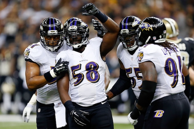 NEW ORLEANS, LA - NOVEMBER 24:  Elvis Dumervil #58 of the Baltimore Ravens celebrates a sack against the New Orleans Saints during the second quarter of a game at the Mercedes-Benz Superdome on November 24, 2014 in New Orleans, Louisiana.  (Photo by Wesley Hitt/Getty Images)