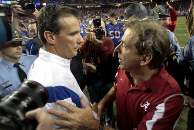 FILE - In this Dec. 8, 2006, file photo, Florida coach Urban Meyer, left, and Alabama coach Nick Saban greet after Florida defeated Alabama 31-20 in the Southeastern Conference Championship NCAA college football game at the Georgia Dome in Atlanta. Florida and Alabama will meet again on Saturday night, Oct. 2, 2010, in Tuscaloosa, Ala. (AP Photo/Dave Martin, File) FILE - In this Dec. 8, 2006, file photo, Florida coach Urban Meyer, left, and Alabama coach Nick Saban greet after Florida defeated Alabama 31-20 in the Southeastern Conference Championship NCAA college football game at the Georgia Dome in Atlanta. Florida and Alabama will meet again on Saturday night, Oct. 2, 2010, in Tuscaloosa, Ala. (AP Photo/Dave Martin, File)
