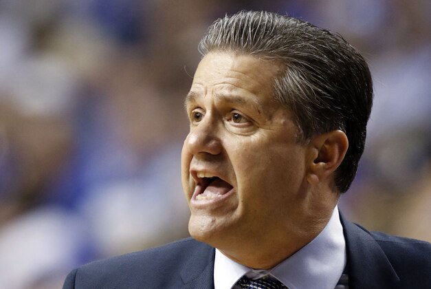 Kentucky head coach John Calipari yells to his team on during the second half of an NCAA college basketball game against Eastern Kentucky, Sunday, Dec. 7, 2014. Kentucky won 82-49. (AP Photo/James Crisp)