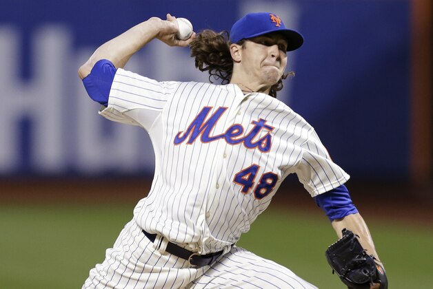 New York Mets' Jacob deGrom (48) delivers a pitch during the first inning of a baseball game against the Colorado Rockies Tuesday, Sept. 9, 2014, in New York.  (AP Photo/Frank Franklin II)