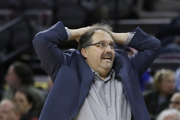 Detroit Pistons head coach Stan Van Gundy reacts to a call during the second half of an NBA basketball game against the Orlando Magic in Auburn Hills, Mich., Monday, Nov. 17, 2014. (AP Photo/Carlos Osorio)