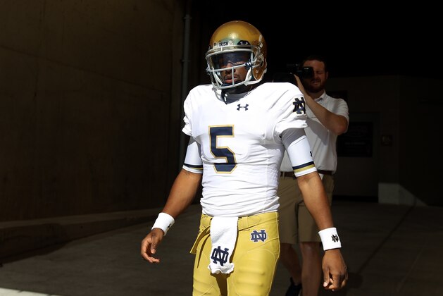TEMPE, AZ - NOVEMBER 08:  Quarterback Everett Golson #5 of the Notre Dame Fighting Irish walks out onto the field before the college football game against the Arizona State Sun Devils at Sun Devil Stadium on November 8, 2014 in Tempe, Arizona.  (Photo by Christian Petersen/Getty Images)
