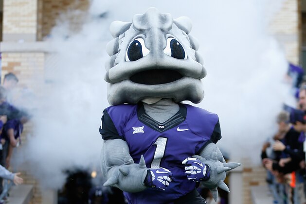 FORT WORTH, TX - DECEMBER 06:  The TCU Horned Frogs mascot, 'Super Frog' performs during the Big 12 college football game against the Iowa State Cyclones at Amon G. Carter Stadium on December 6, 2014 in Fort Worth, Texas. The Horned Frongs defeated the Cyclones 55-3. (Photo by Christian Petersen/Getty Images)