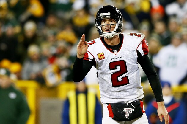 GREEN BAY, WI - DECEMBER 08:   Matt Ryan #2 of the Atlanta Falcons calls a play against the Green Bay Packers in the second half at Lambeau Field on December 8, 2014 in Green Bay, Wisconsin.  (Photo by Kevin C. Cox/Getty Images)