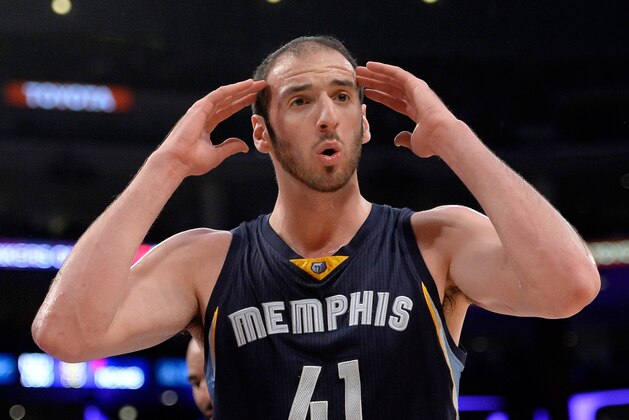 LOS ANGELES, CA - NOVEMBER 26:  Kosta Koufos #41 of the Memphis Grizzlies reacts to a foul during the first half against the Los Angeles Lakers at Staples Center on November 26, 2014 in Los Angeles, California.  NOTE TO USER: User expressly acknowledges and agrees that, by downloading and or using this Photograph, user is consenting to the terms and condition of the Getty Images License Agreement.  (Photo by Harry How/Getty Images)