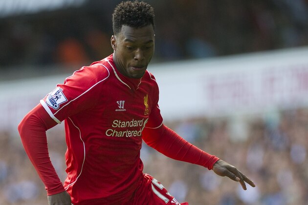 Liverpool's Daniel Sturridge controls the ball against Tottenham Hotspur, during their English Premier League soccer match at White Hart Lane, London, Sunday, Aug. 31, 2014 (AP Photo/Bogdan Maran)