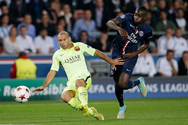 PARIS, FRANCE - SEPTEMBER 30:  Blaise Matuidi of PSG and Javier Mascherano of Barcelona battle for the ball during the Group F UEFA Champions League match between Paris Saint-Germain v FC Barcelona held at Parc des Princes on September 30, 2014 in Paris, France.  (Photo by Dean Mouhtaropoulos/Getty Images)