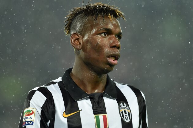 TURIN, ITALY - NOVEMBER 30:  Paul Pogba of Juventus FC looks on during the Serie A match between Juventus FC and Torino FC at Juventus Arena on November 30, 2014 in Turin, Italy.  (Photo by Valerio Pennicino/Getty Images)