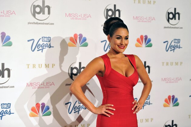 Professional wrestler and pageant judge Nikki Bella arrives at the Miss USA 2013 pageant, Sunday, June 16, 2013, in Las Vegas. (AP Photo/Jeff Bottari)