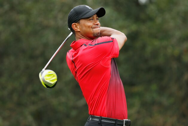WINDERMERE, FL - DECEMBER 07:  Tiger Woods hits his tee shot on the fourth hole during the final round of the Hero World Challenge at the Isleworth Golf & Country Club on December 7, 2014 in Windermere, Florida.  (Photo by Scott Halleran/Getty Images)
