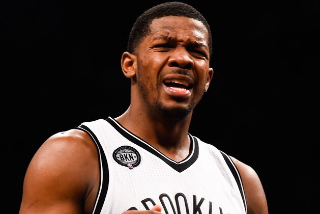 NEW YORK, NY - DECEMBER 03: Joe Johnson #7 of the Brooklyn Nets reacts to a foul in the second half during a game against the San Antonio Spurs at the Barclays Center on December 3, 2014 in the Brooklyn borough of New York City. NOTE TO USER: User expressly acknowledges and agrees that, by downloading and/or using this photograph, user is consenting to the terms and conditions of the Getty Images License Agreement.  (Photo by Alex Goodlett/Getty Images)