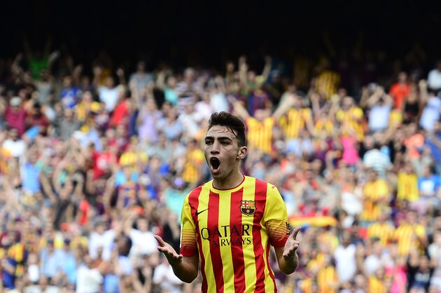FC Barcelona's Munir El Haddadi Mohamed gestures during a Spanish La Liga soccer match against Athletic Bilbao at the Camp Nou stadium in Barcelona, Spain, Saturday, Sept. 13, 2014. (AP Photo/Manu Fernandez)