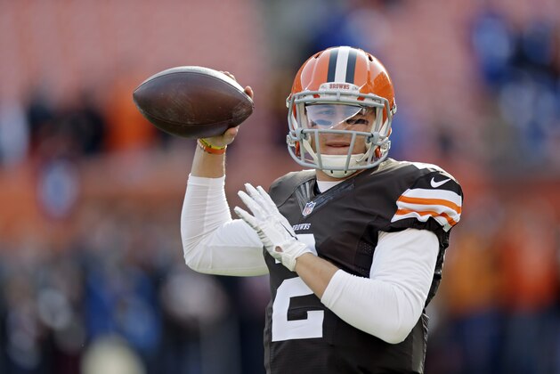 Cleveland Browns quarterback Johnny Manziel warms up before an NFL football game against the Indianapolis Colts Sunday, Dec. 7, 2014, in Cleveland. (AP Photo/Tony Dejak)