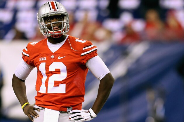 INDIANAPOLIS, IN - DECEMBER 06:  Quarterback Cardale Jones #12 of the Ohio State Buckeyes smiles on the field during warm ups before playing against the Wisconsin Badgers in the Big Ten Championship at Lucas Oil Stadium on December 6, 2014 in Indianapolis, Indiana.  (Photo by Andy Lyons/Getty Images)