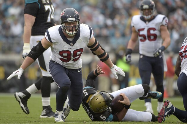 Houston Texans defensive end J.J. Watt (99) celebrates after sacking Jacksonville Jaguars quarterback Blake Bortles (5) during the first half of an NFL football game in Jacksonville, Fla., Sunday, Dec. 7, 2014.(AP Photo/Phelan M. Ebenhack)
